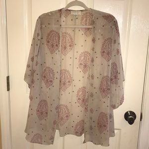 Sheer cover up with pink and black designs